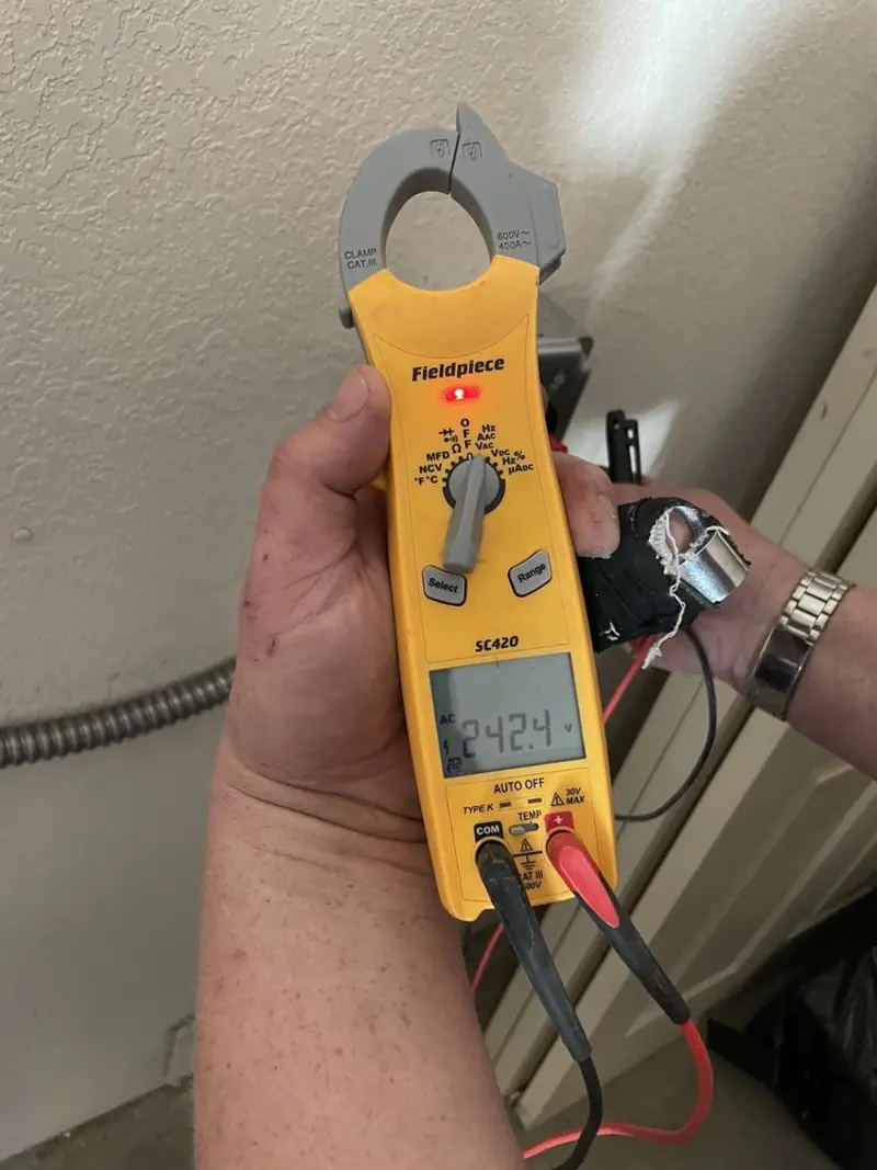 Voltage testing with clamp meter during Circuit Breaker Repair in Fort Lee